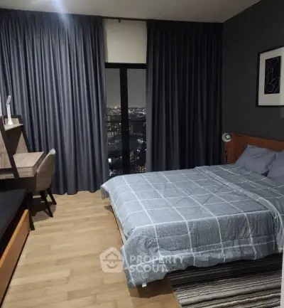 Modern bedroom with city view, featuring stylish decor and cozy ambiance for ultimate relaxation.
