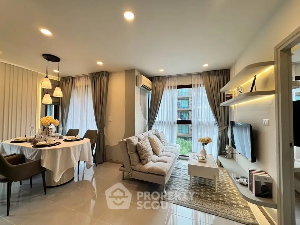 Modern living room with elegant dining area and large windows