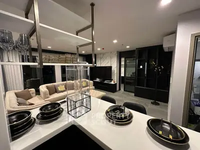 Luxurious modern living room with open kitchen and elegant decor