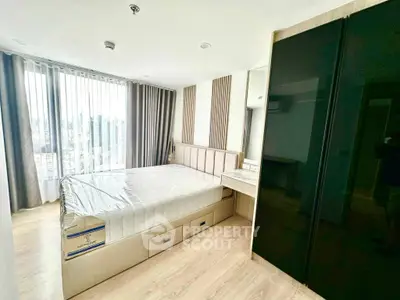 Spacious modern bedroom with large windows and sleek design