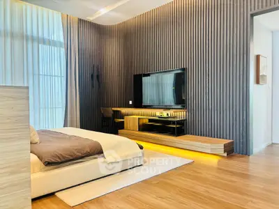 Luxurious modern bedroom with sleek wooden paneling and ambient lighting