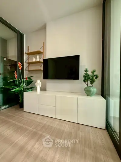Modern living room with sleek TV setup and stylish decor