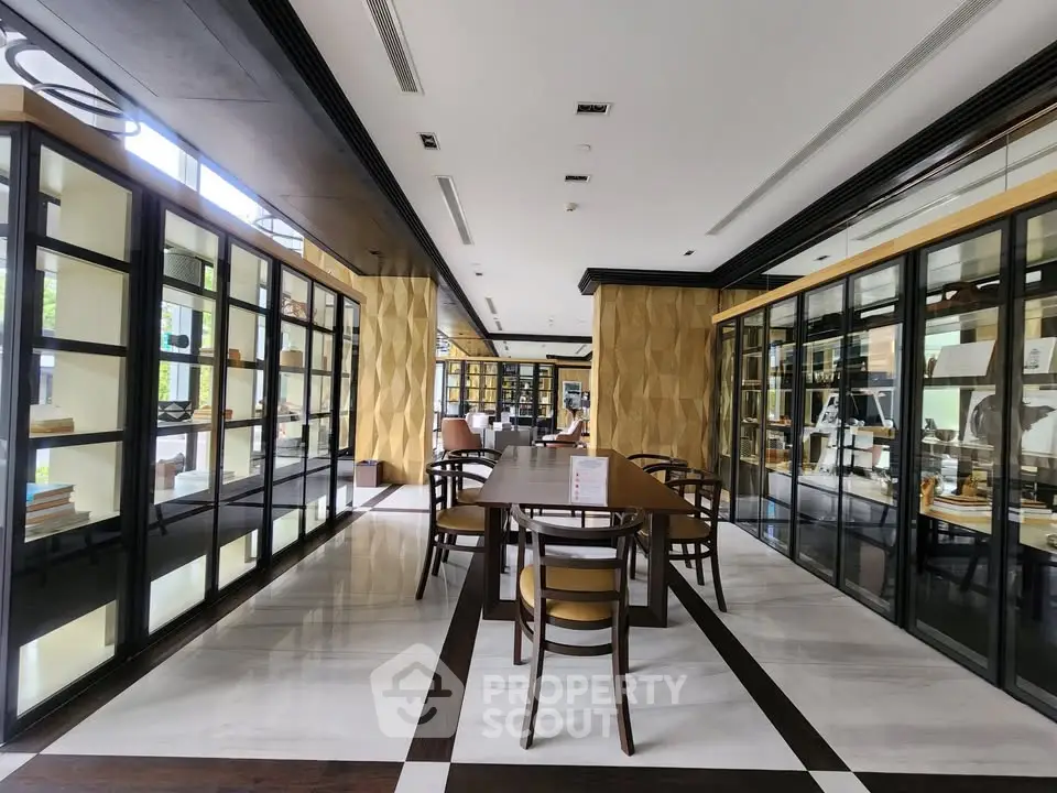 Luxurious library with modern design and elegant wooden furniture in a high-end building.