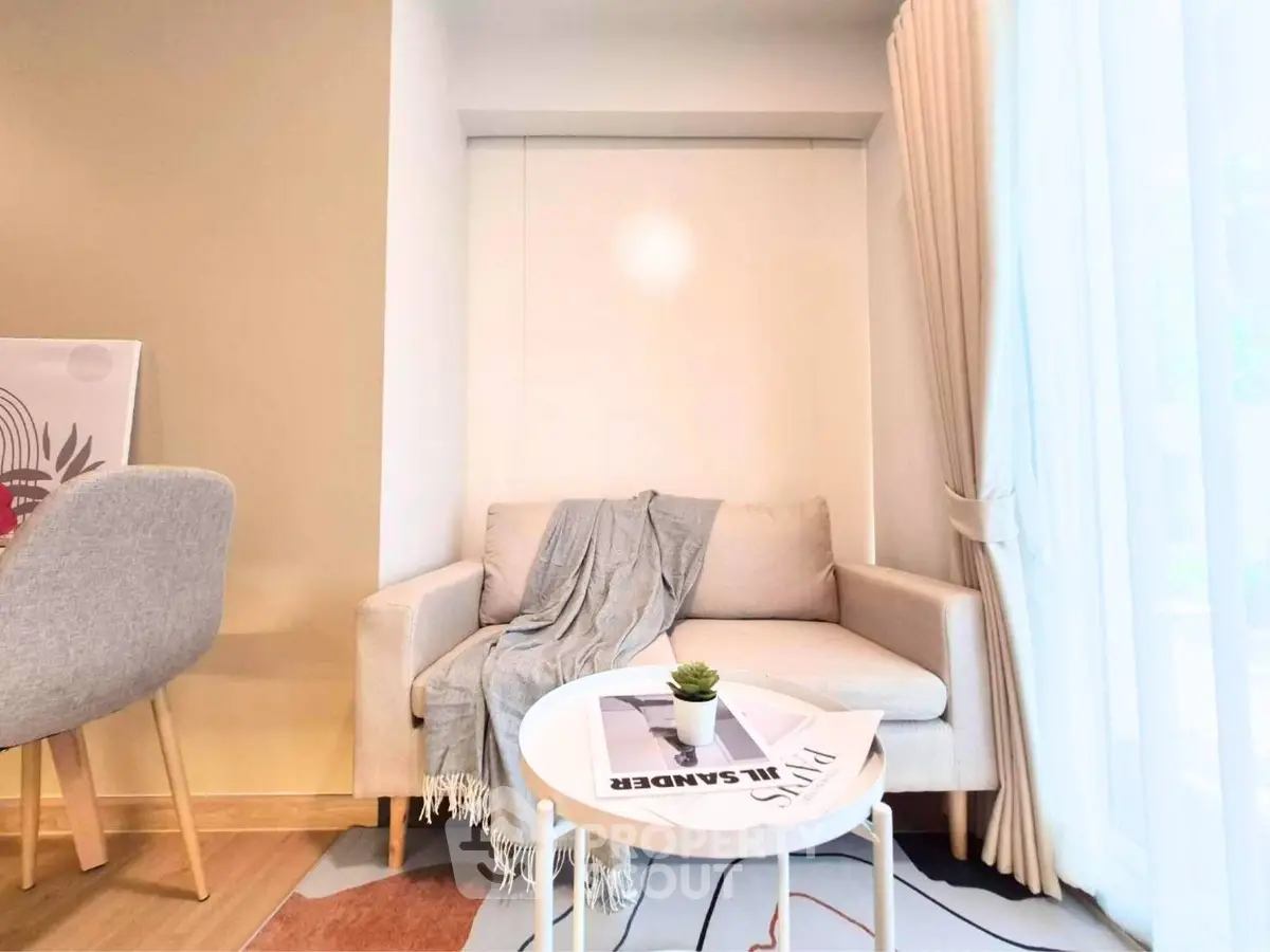 Cozy living room corner with modern sofa and natural light