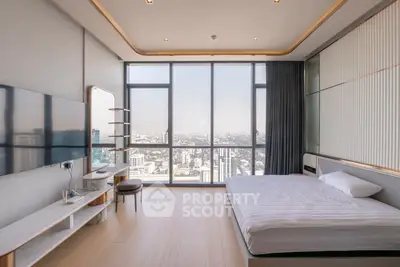 Luxurious bedroom with panoramic city view and modern decor
