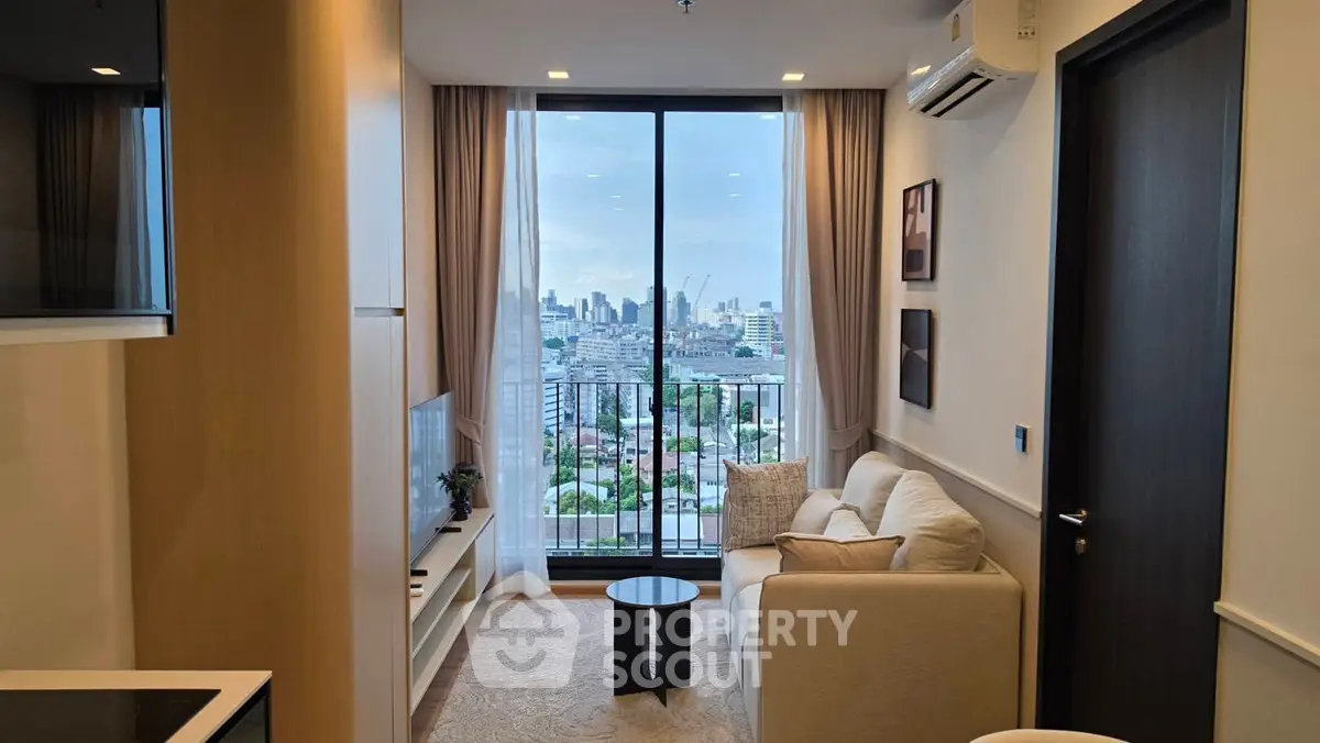 Modern living room with city view, cozy sofa, and sleek decor in high-rise apartment.