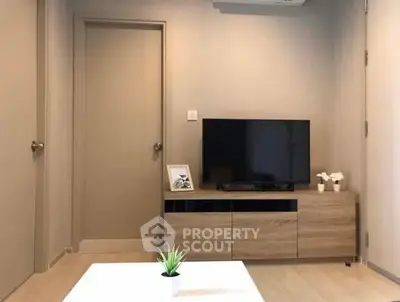 Modern living room with sleek TV stand and minimalist decor