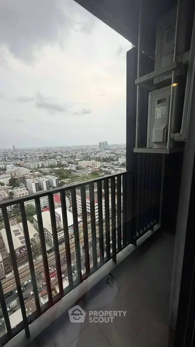 Stunning high-rise balcony with panoramic city views, perfect for urban living enthusiasts.