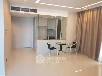 Modern minimalist living area with sleek design and neutral tones