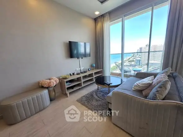 Modern living room with stunning ocean view and elegant decor