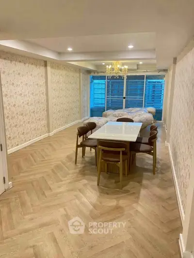 Spacious living room with elegant dining area and stylish decor