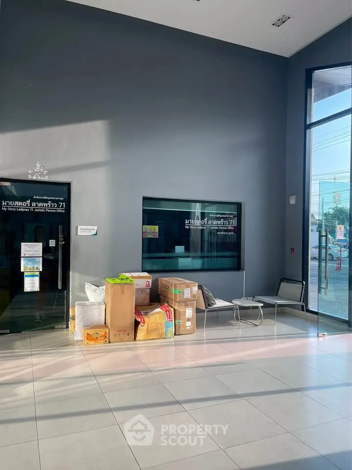 Spacious building entrance with modern design and natural light