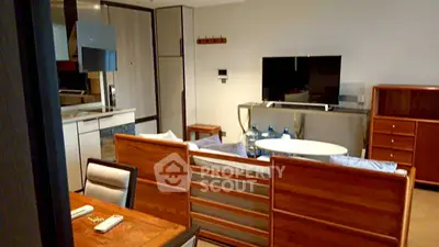 Modern living room with stylish wooden furniture and open kitchen layout