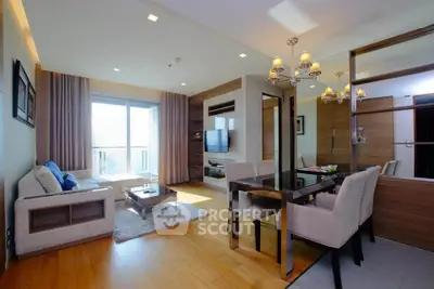 Spacious modern living room with elegant dining area and large windows for natural light.