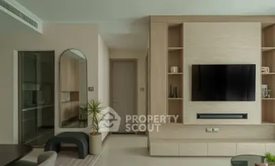 Modern living room with sleek TV setup and stylish decor