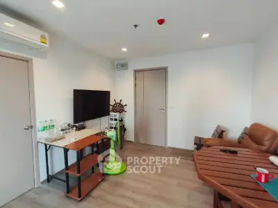 Modern living room with stylish furniture and entertainment setup