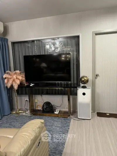 Modern living room with sleek TV setup and stylish decor