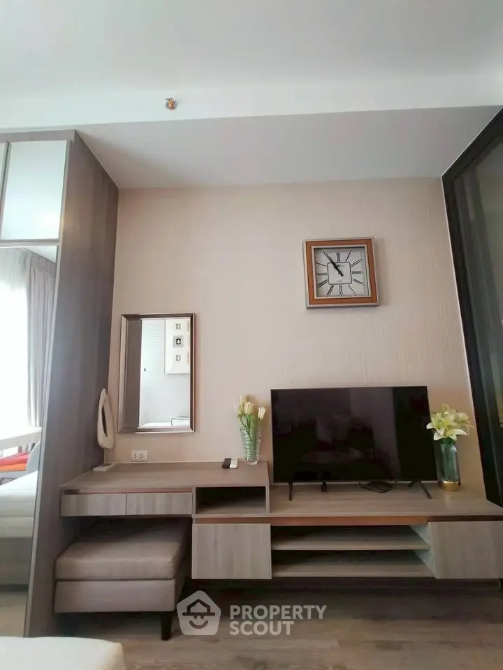 Modern living room with stylish TV unit and elegant decor