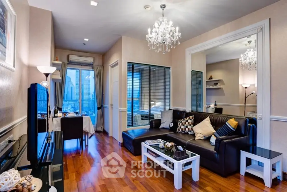 Luxurious living room with elegant chandelier and city view, perfect for modern urban living.