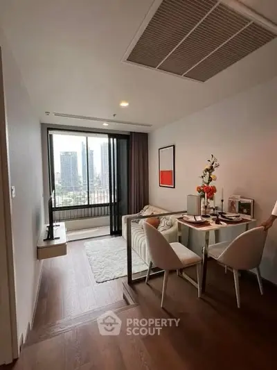 Modern living room with city view, stylish dining area, and elegant decor.
