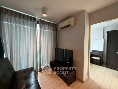 Modern living room with sleek furniture and natural light