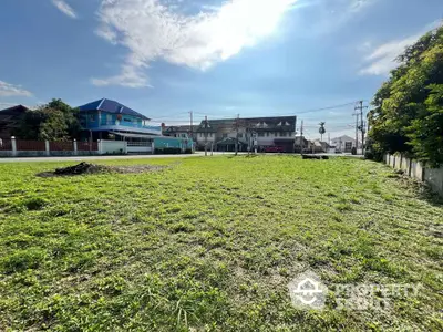 Spacious green land plot in a serene neighborhood ideal for development.