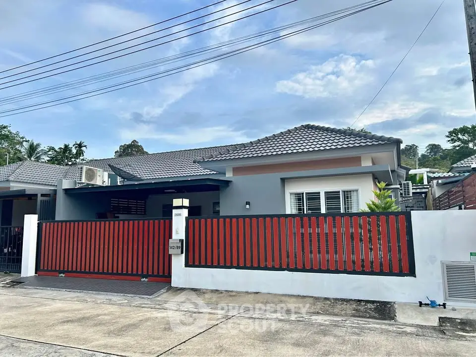 Charming single-story house with modern design and spacious front yard