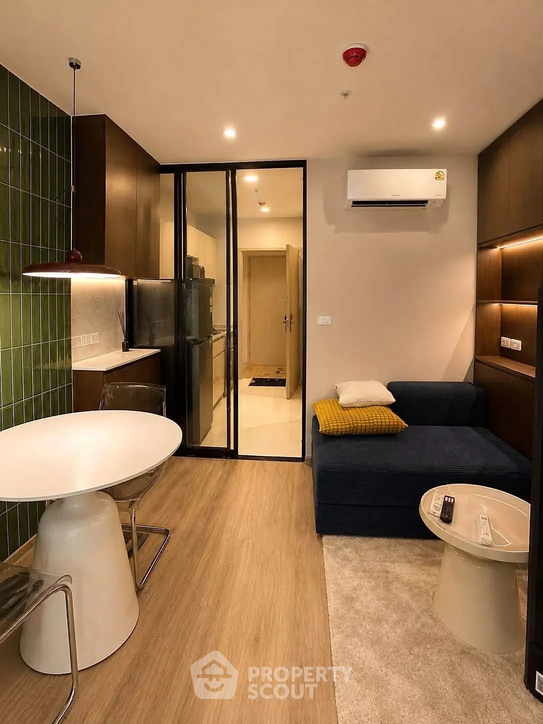 Modern living room with sleek furniture and stylish decor in a contemporary apartment.