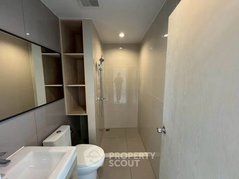 Modern bathroom with sleek design and spacious shower area