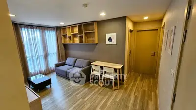 Modern living room with wooden flooring and stylish furniture