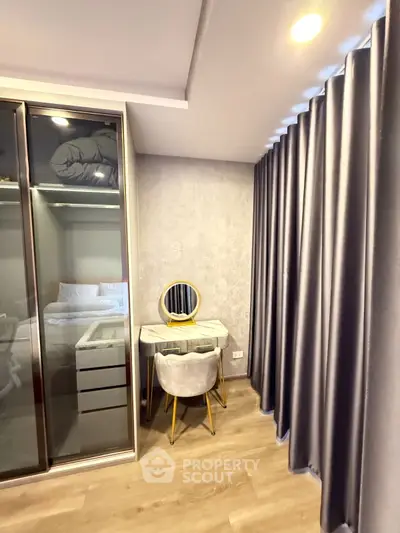 Chic bedroom corner with modern vanity and sleek wardrobe