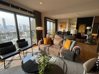 Spacious modern living room with city view and stylish decor