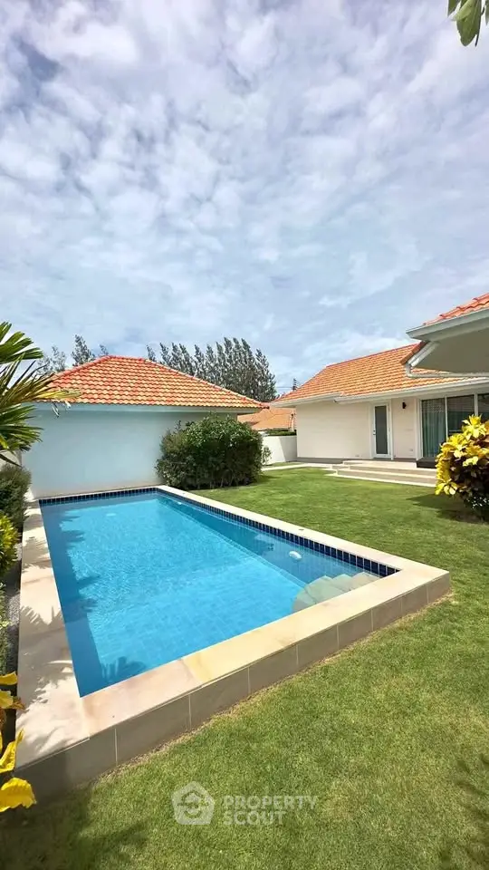 Stunning villa with private pool and lush garden, perfect for luxury living.