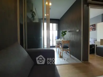 Modern apartment interior with cozy living room and dining area, featuring stylish decor and natural light.