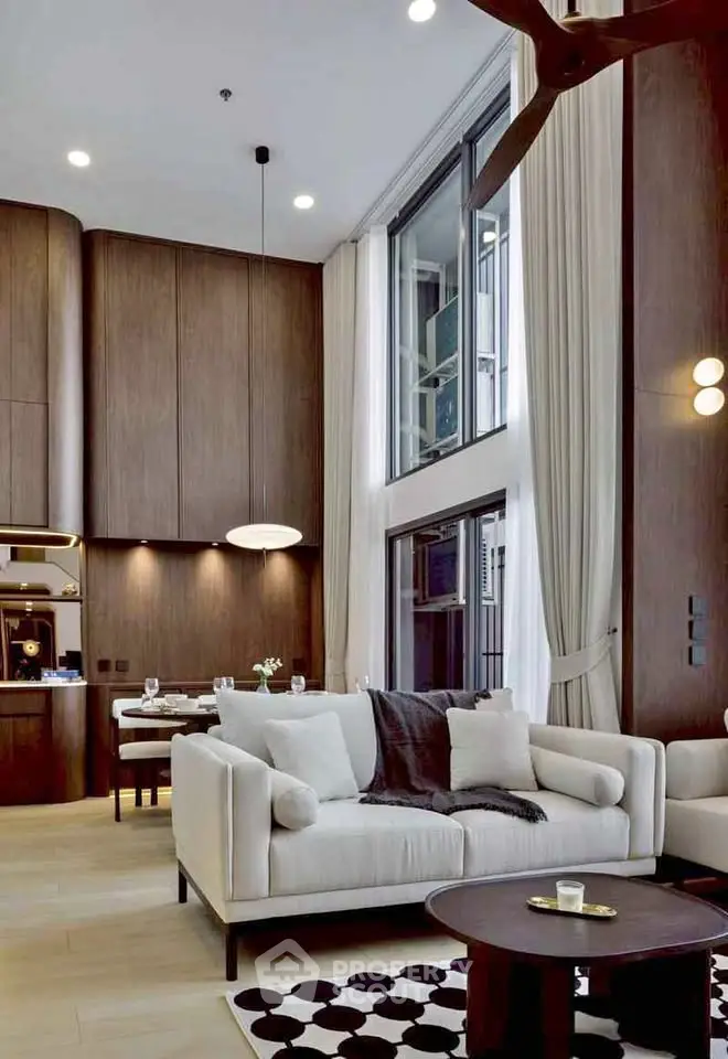 Luxurious modern living room with high ceilings and elegant decor