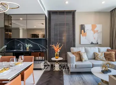 Modern living room with stylish decor and open kitchen layout