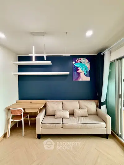 Modern living room with stylish decor, featuring a beige sofa, chic wall art, and a cozy dining area.