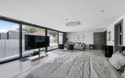 Luxurious modern bedroom with large windows and stylish decor