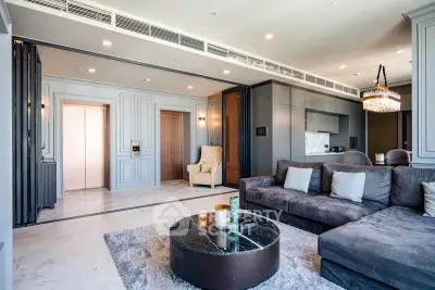 Luxurious modern living room with elegant decor and open kitchen layout