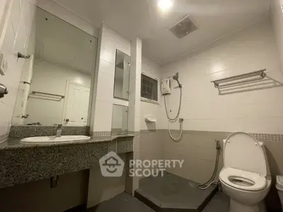 Modern bathroom with sleek fixtures and spacious layout
