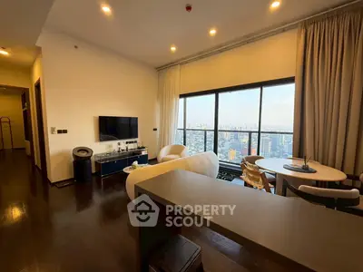Luxurious high-rise living room with stunning city view and modern furnishings.