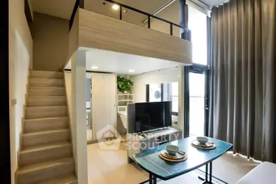 Modern loft apartment with stylish mezzanine and open living area, featuring sleek furniture and abundant natural light.