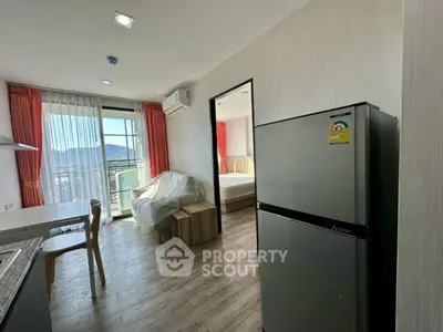 Modern apartment interior with kitchen and balcony view