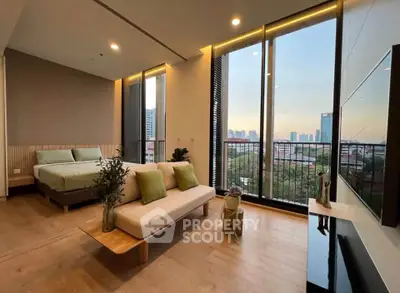 Luxurious modern living room with stunning city view and elegant decor