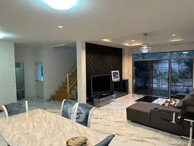 Luxurious modern living room with marble flooring and elegant decor