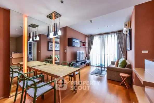 Spacious living room with modern decor and natural light