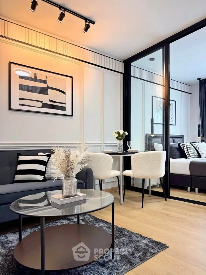 Stylish modern living room with elegant decor and cozy seating area, perfect for relaxation and entertaining.