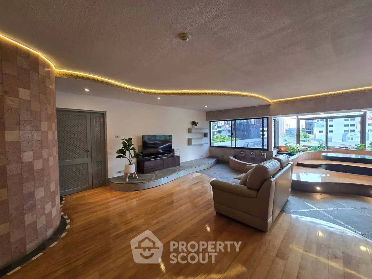 Spacious living room with modern design and city view