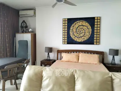 Cozy bedroom with elegant decor and modern furniture in a stylish apartment.