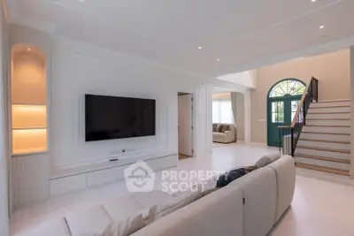 Spacious modern living room with elegant design and large TV